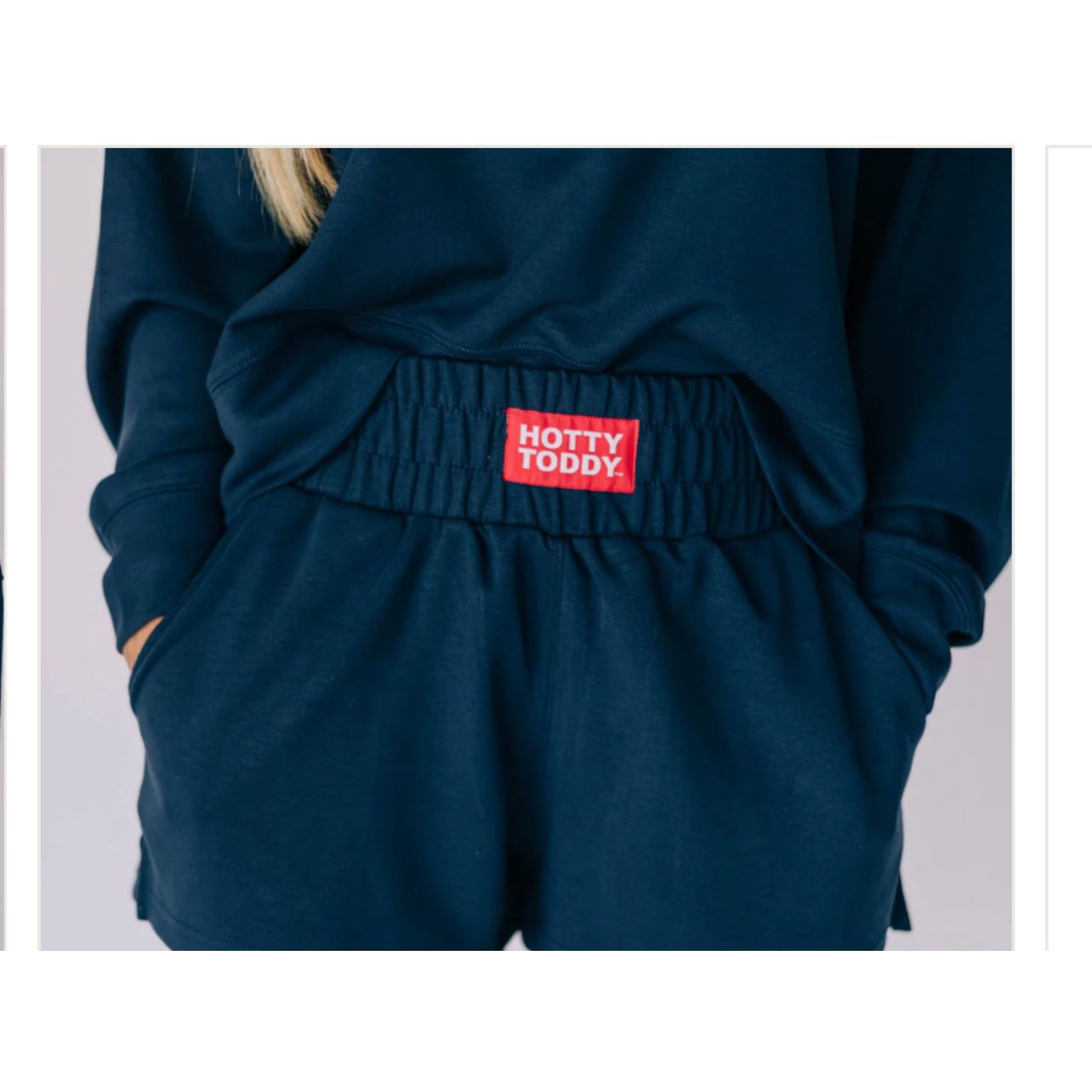 Navy blue shorts with a red 'Hotty Toddy' label on a white background