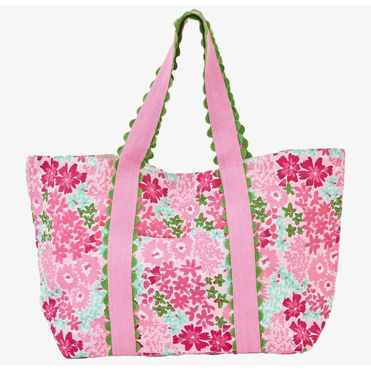 Floral tote bag with pink straps on a white background