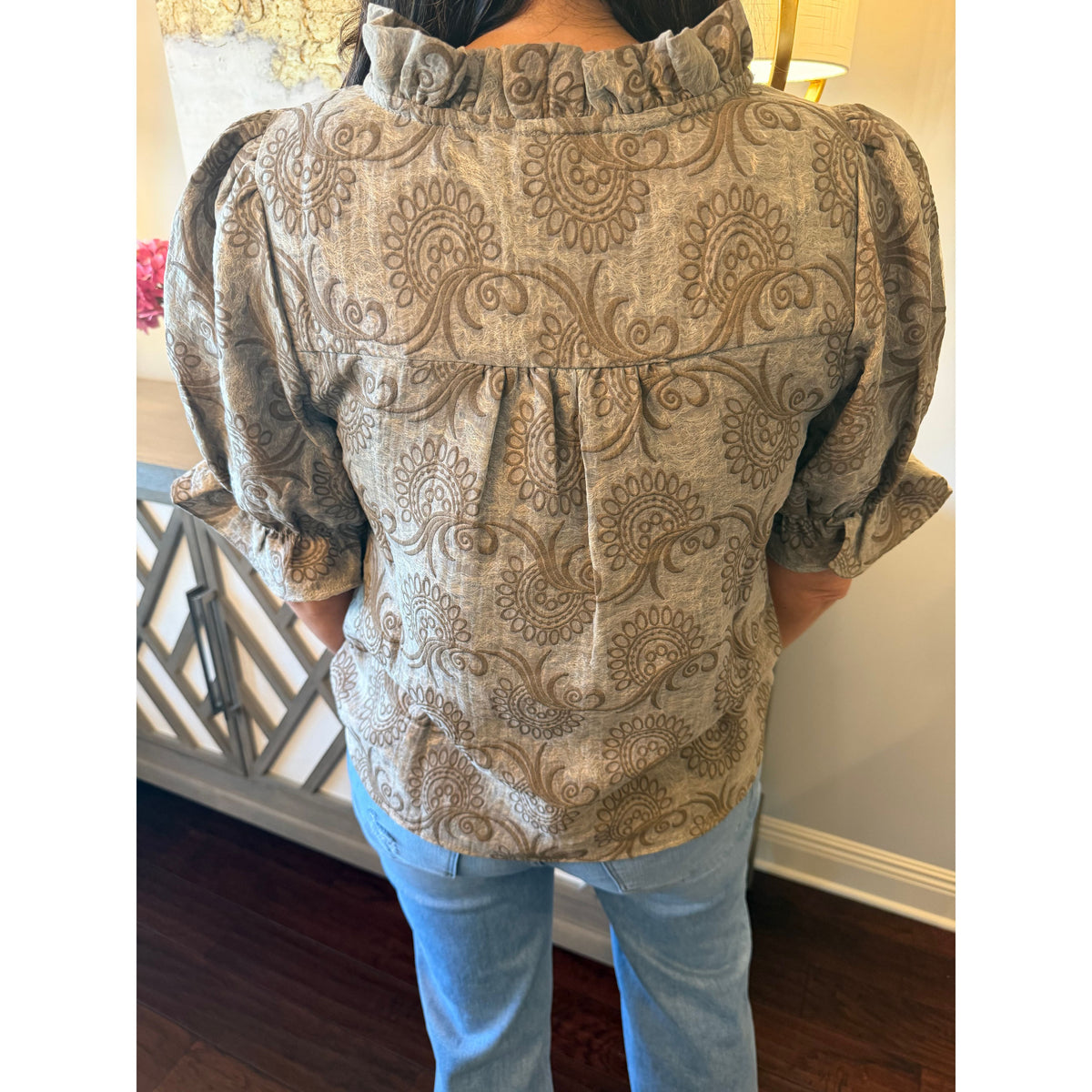Annie Ks Boutique brown paisley print blouse with ruffle neck and puff sleeves, back view