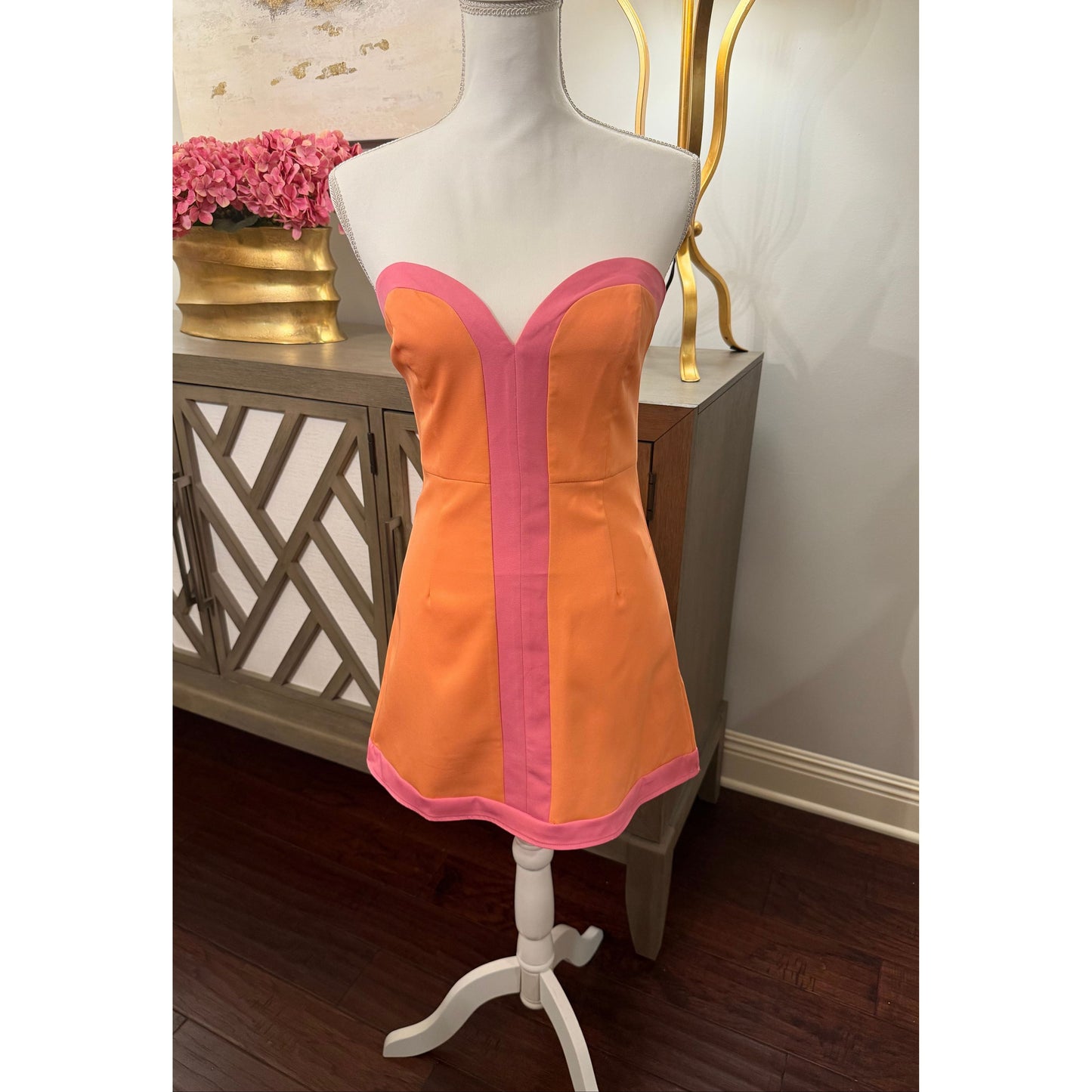 Annie Ks Boutique strapless colorblock romper dress in peach and pink with sweetheart neckline and structured bodice.