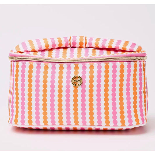 Striped fabric bag with a gold zipper on a light pink background