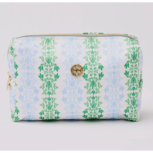 Cosmetic bag with green floral pattern on a light gray background