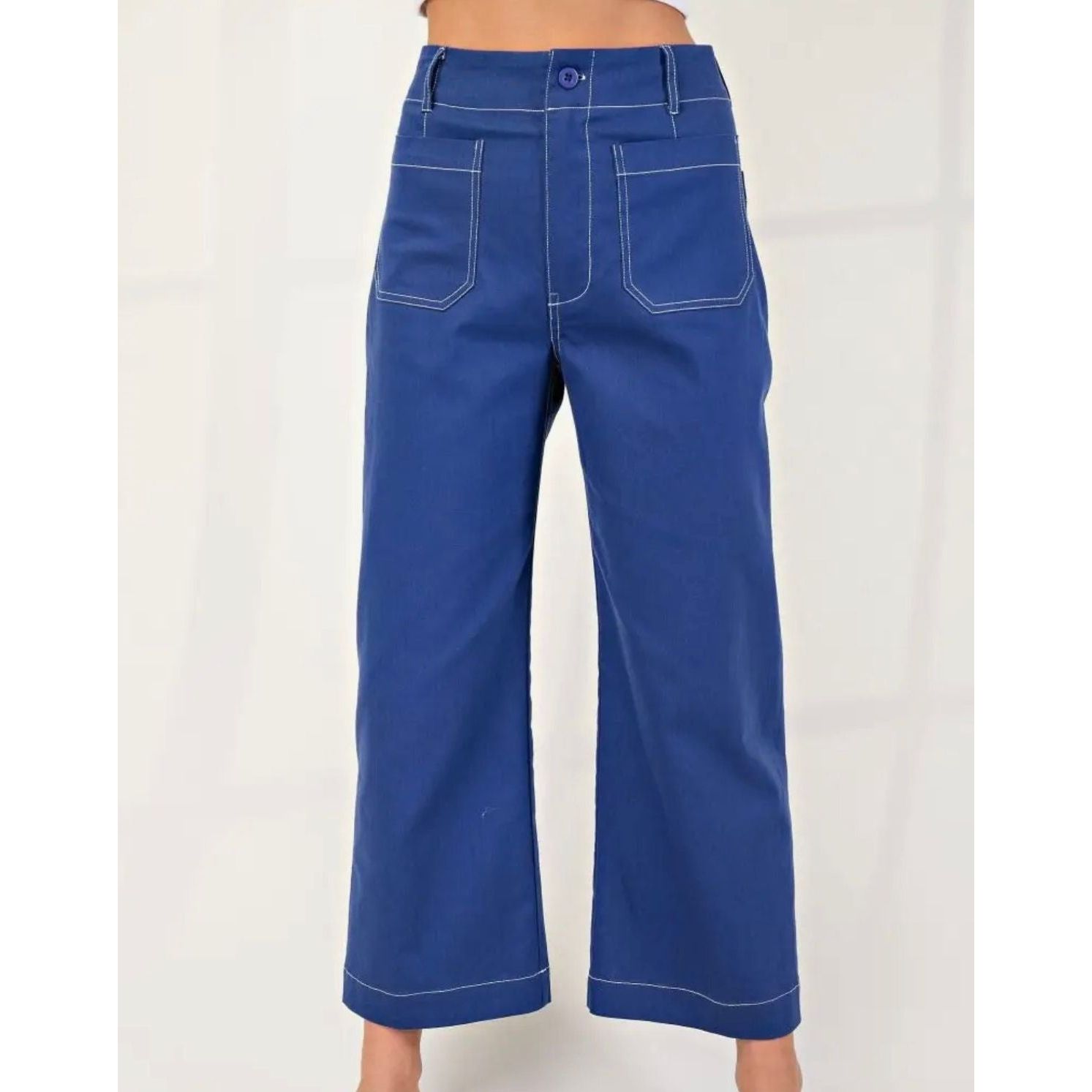 Blue wide-leg pants worn by a person on a white background