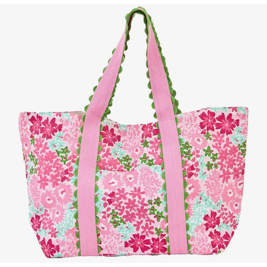 Floral tote bag with pink straps on a white background
