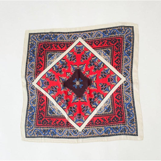 Annie Ks Boutique Alice Square Scarf in Burke Block featuring a red, blue, and cream geometric floral pattern.