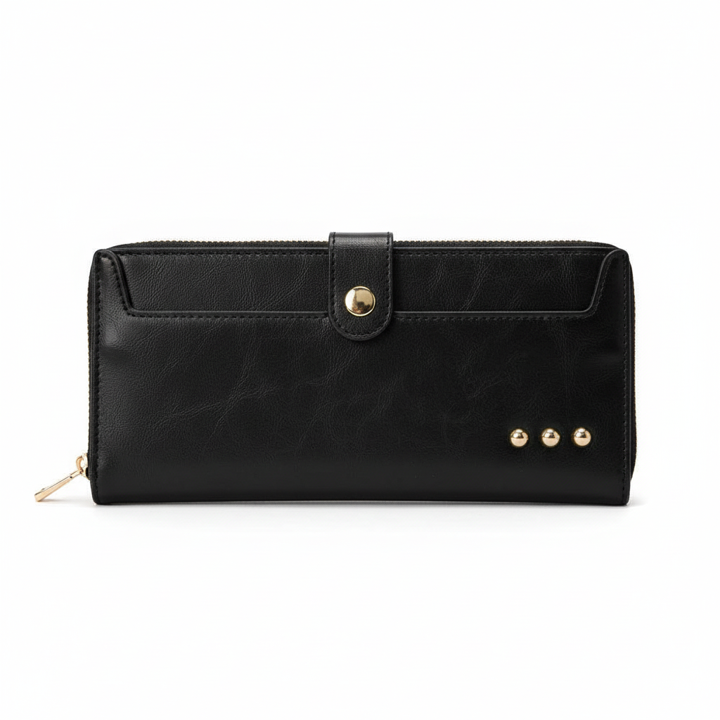 Annie Ks Boutique black Essentials Carryall Wallet with gold snap closure and three decorative studs on the front.