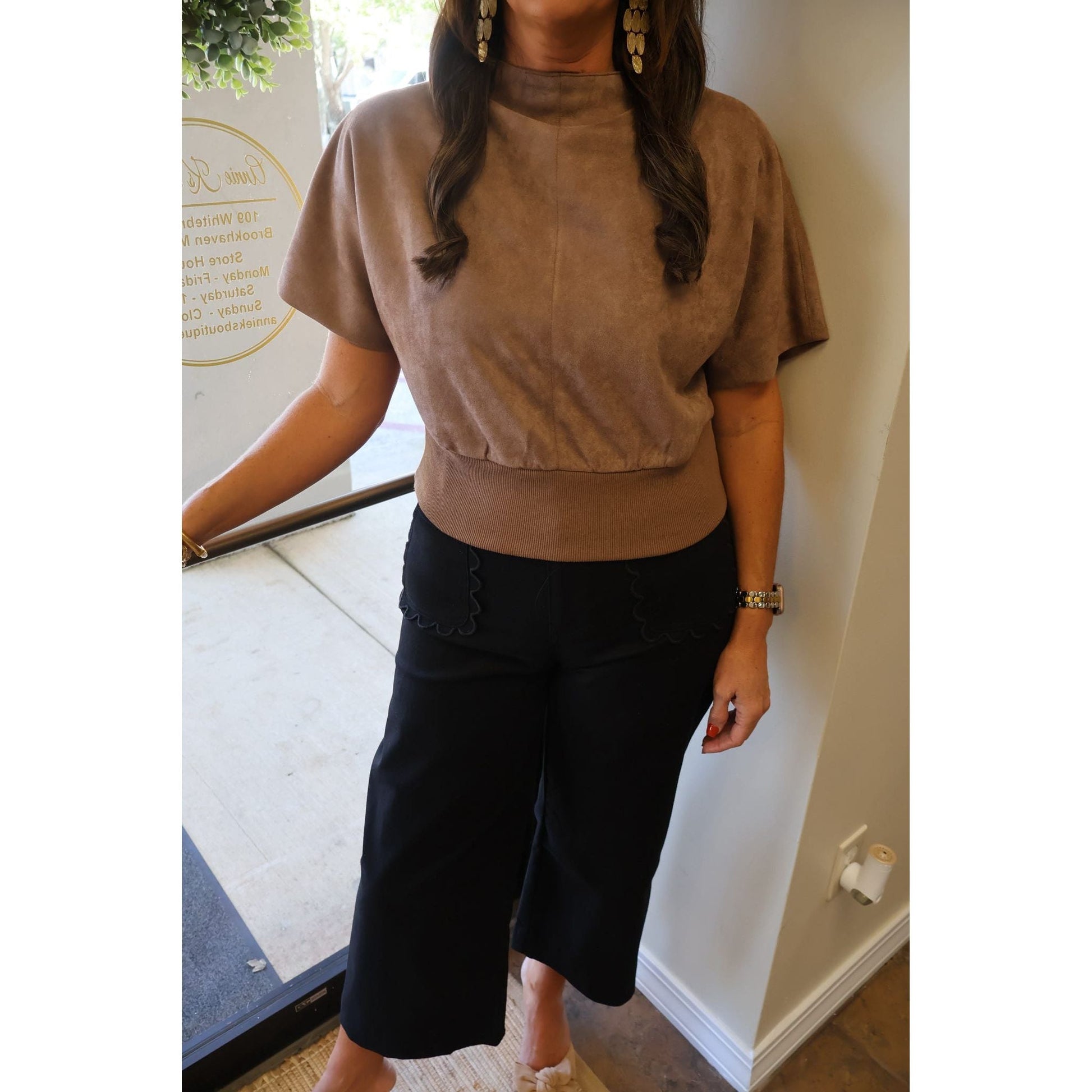 Annie Ks Boutique black cropped wide-leg pants featuring signature scalloped pocket detailing in a cotton blend