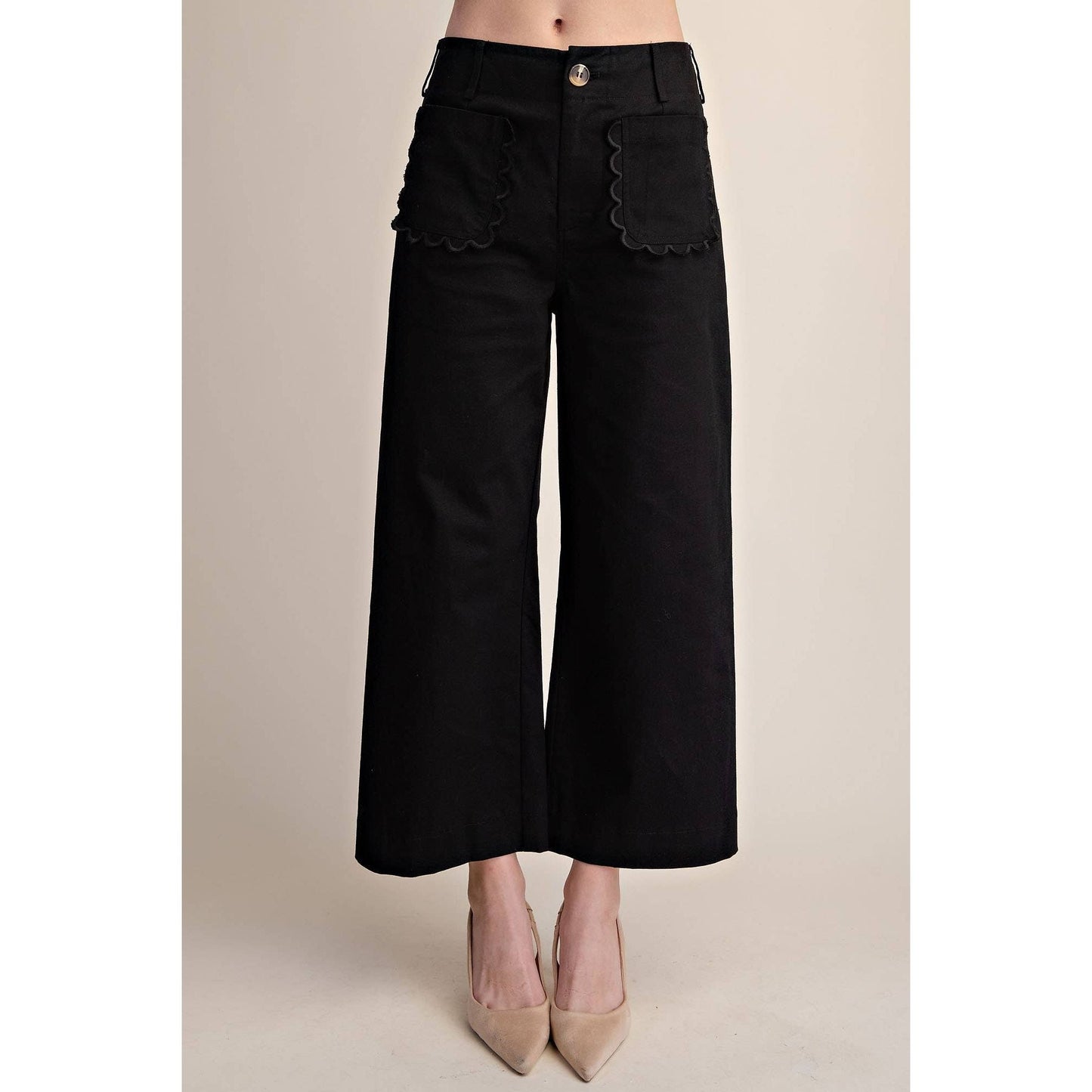 Annie Ks Boutique black cropped wide-leg pants featuring signature scalloped pocket detailing in cotton-stretch blend