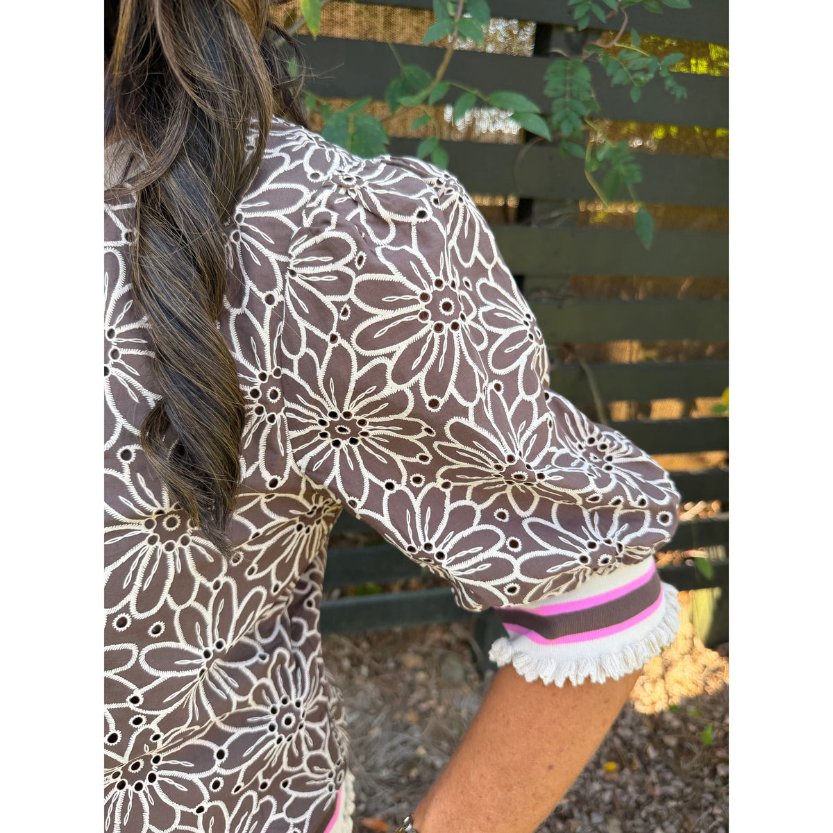 Annie Ks Boutique brown floral eyelet top with puff sleeves and striped ribbed knit cuff detail