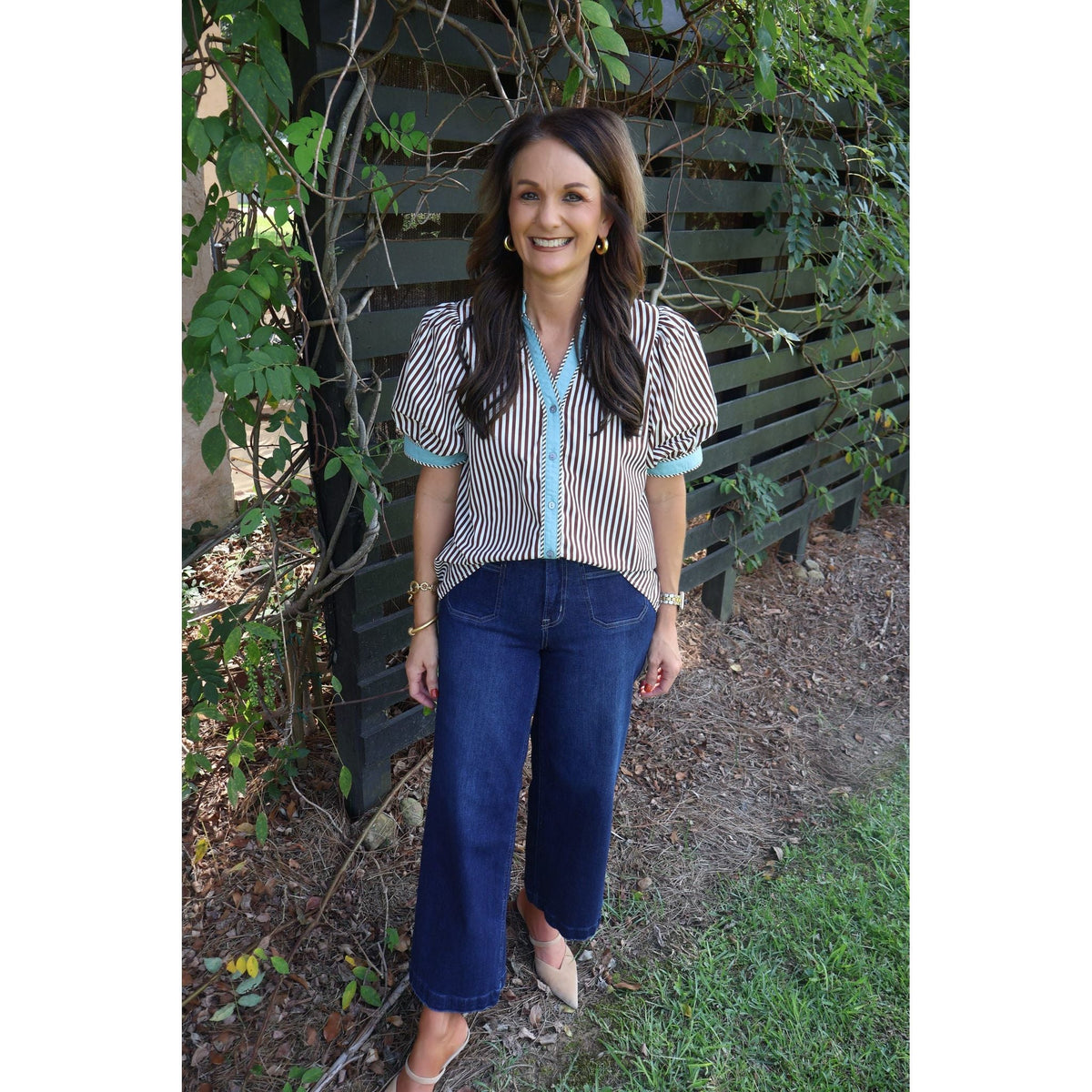 Annie Ks Boutique brown and cream striped cotton top with puff sleeves worn with dark denim jeans