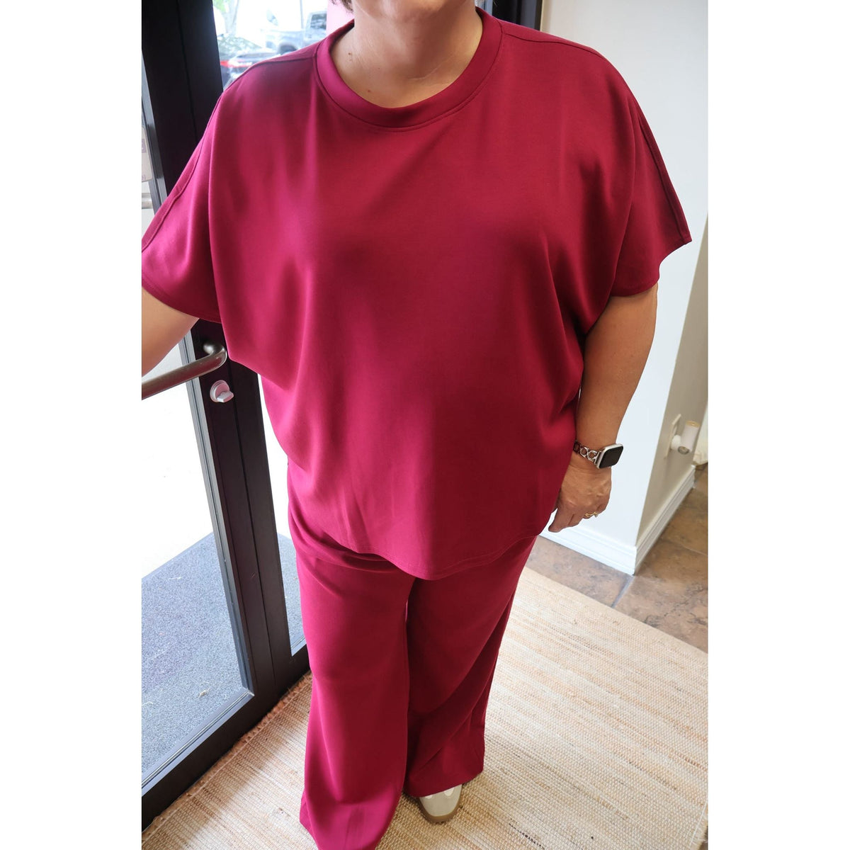Annie Ks Boutique plus size cabernet scuba knit matching top and wide-leg pants set with a curved hem