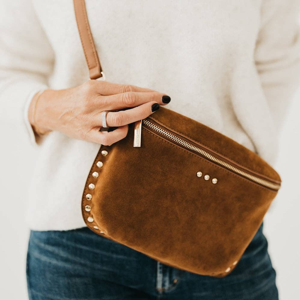 Annie Ks Boutique Sabrina camel vegan suede bum bag with gold rivet studs worn as a crossbody sling