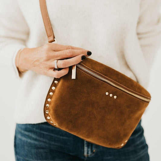 Annie Ks Boutique Sabrina camel vegan suede bum bag with gold rivet studs worn as a crossbody sling