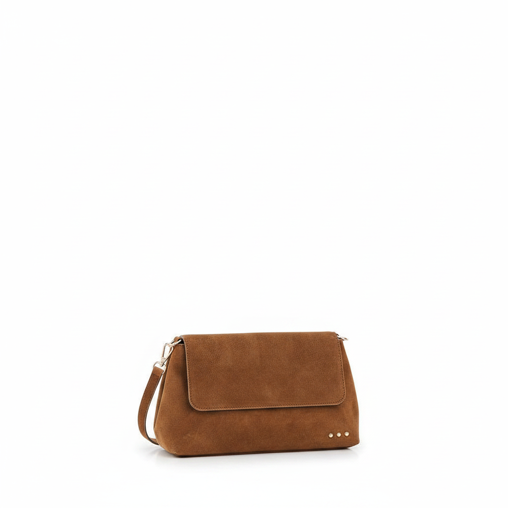 Annie Ks Boutique Miranda camel faux suede crossbody bag with a fold-over flap and small gold stud detailing.