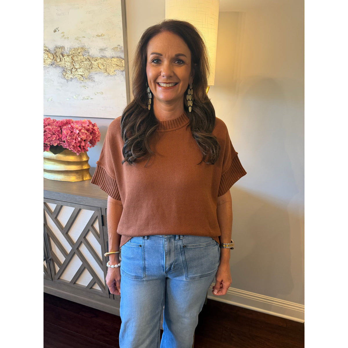 Annie Ks Boutique caramel crew neck sweater with drop-shoulder half sleeves worn by a woman with light wash jeans