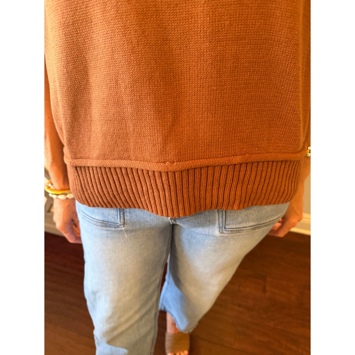 Annie Ks Boutique caramel half-sleeve knit sweater with ribbed hem worn with light wash jeans