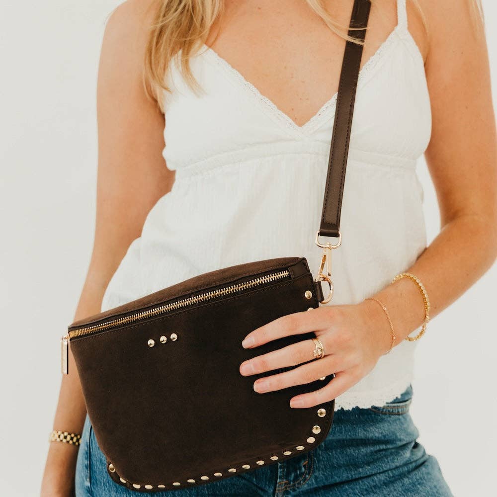 Annie Ks Boutique chocolate brown vegan suede bum bag worn as a crossbody with gold rivet studs and zipper closure