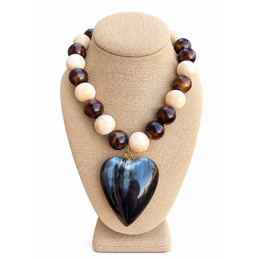 Annie Ks Boutique Cocoa & Cream Heart Necklace featuring glossy marbled brown and ivory baubles with a large heart charm