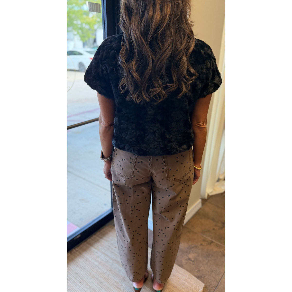 Annie Ks Boutique cocoa barrel pants with black polka dots, featuring a relaxed fit and tapered ankle, back view.