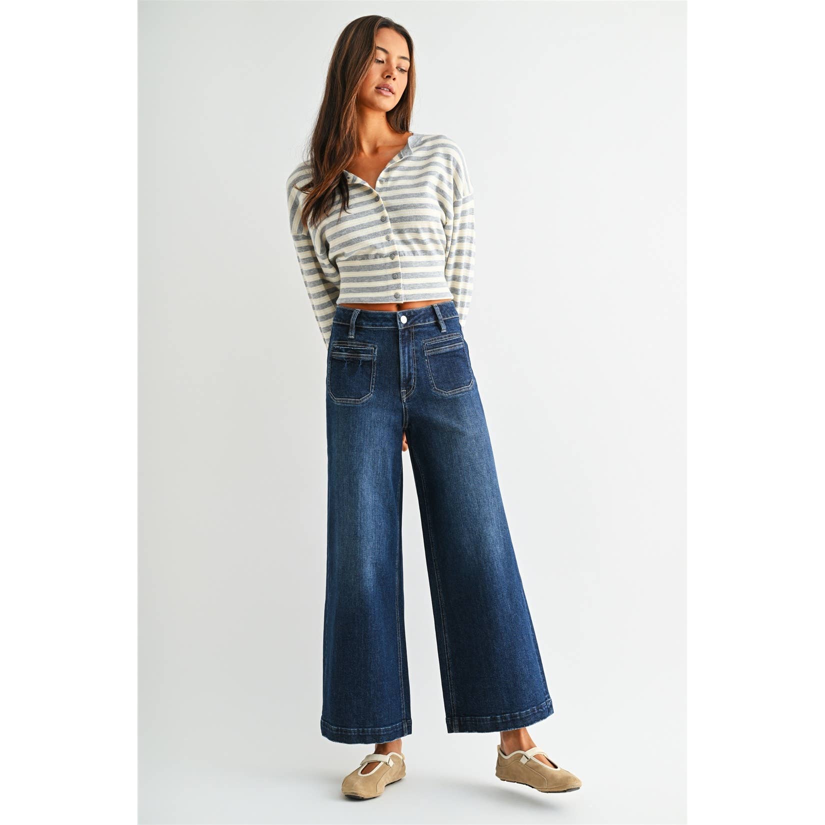 Annie Ks Boutique dark wash high-rise wide leg crop jeans with front patch pockets worn by a model