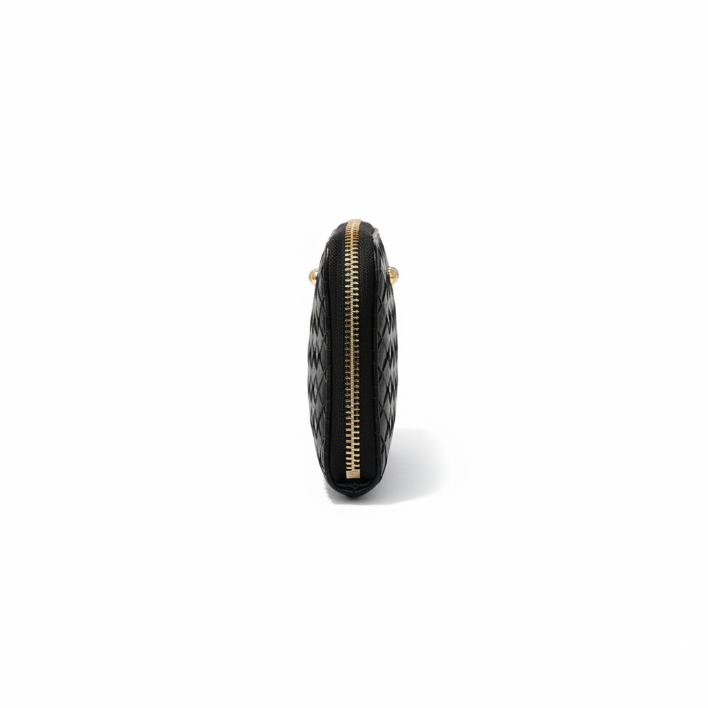 Annie Ks Boutique Lenni large zip-around wallet in black woven vegan leather, side view showing gold zipper detail.