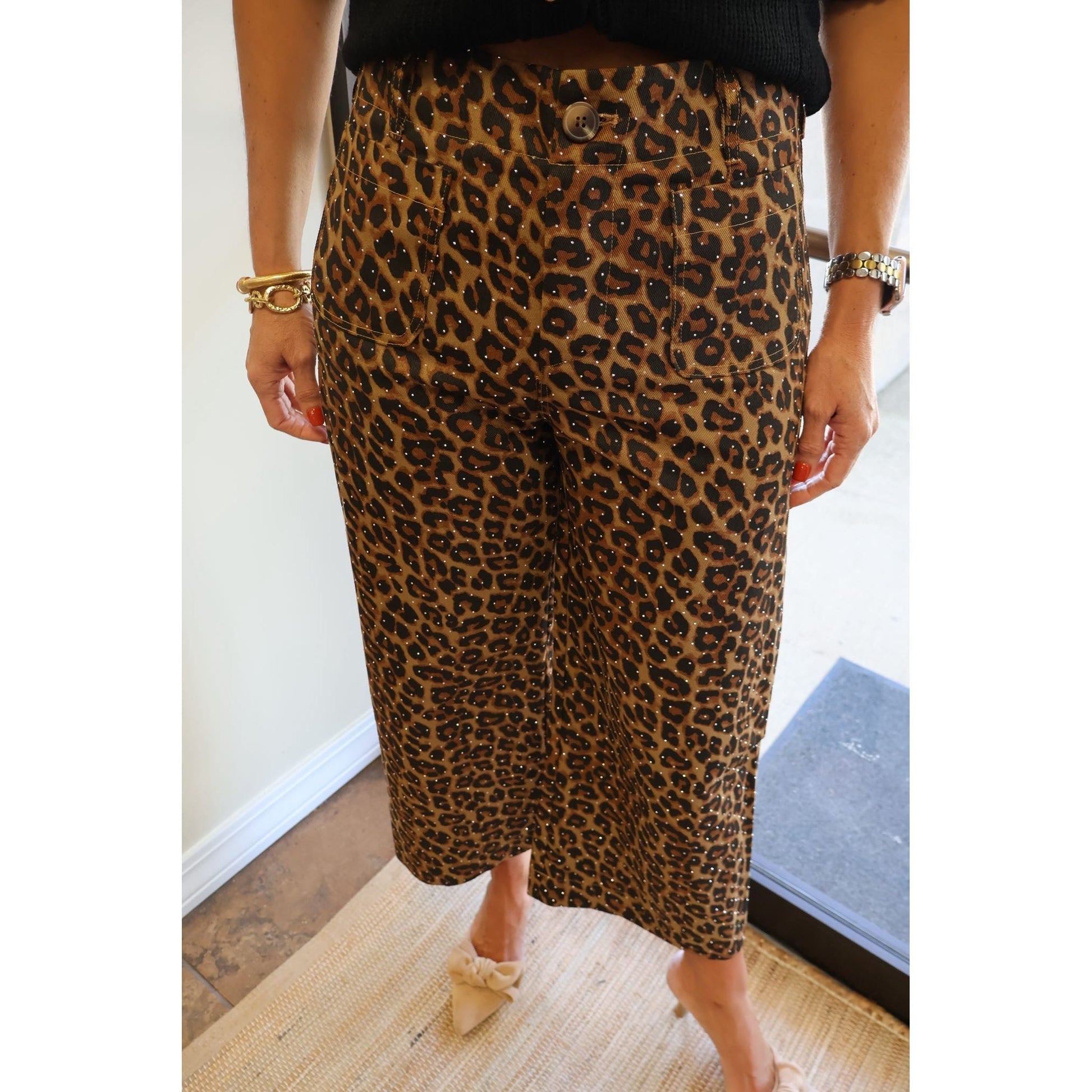 Annie Ks Boutique mocha leopard print cotton cropped pants with subtle rhinestone embellishments on a model