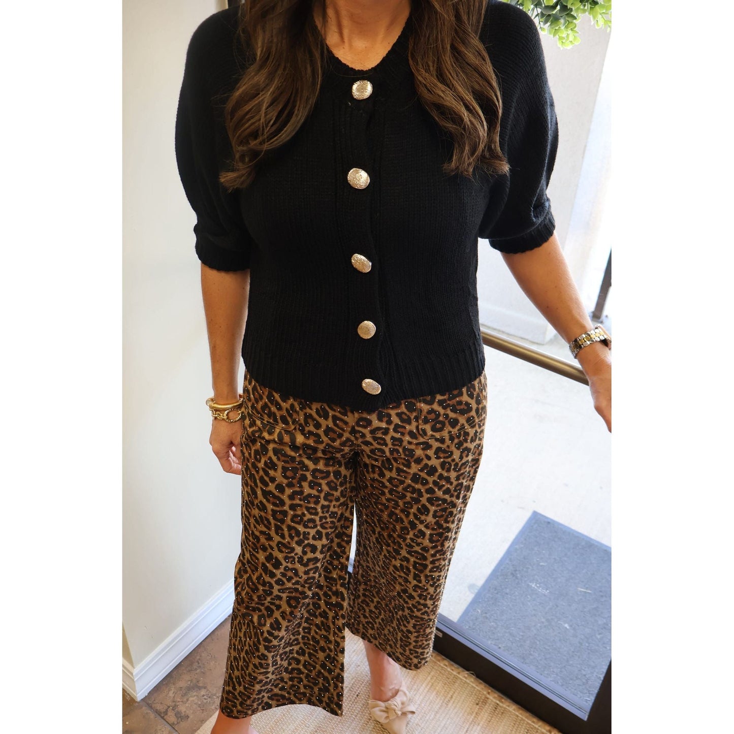 Annie Ks Boutique mocha leopard print cropped cotton pants with rhinestone details paired with a black button cardigan