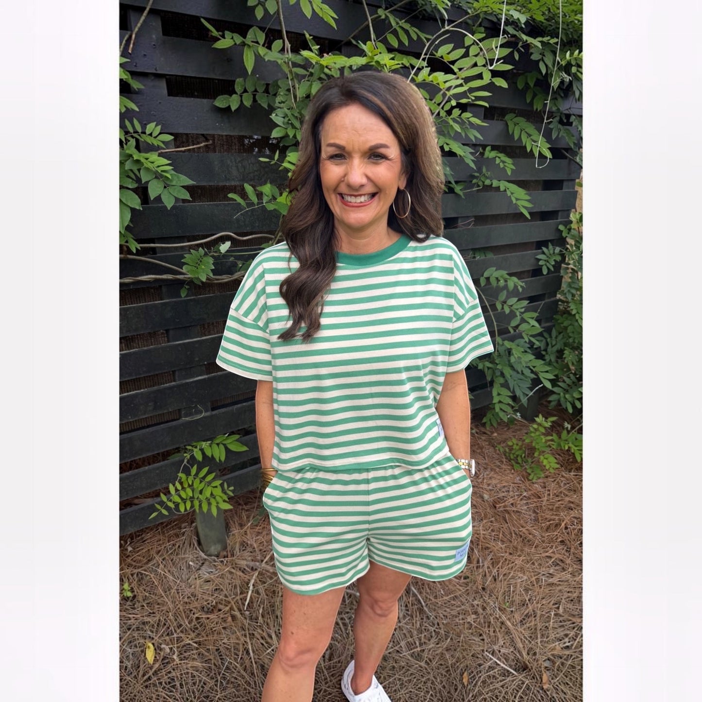 Annie Ks Boutique lime green and white striped cotton blend short set worn by a woman outdoors.
