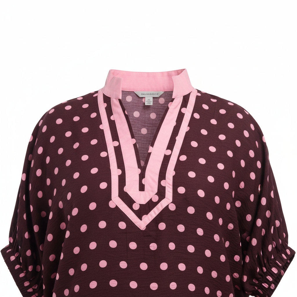 Annie Ks Boutique curvy merlot top with pink polka dots, V-neckline, contrast collar, and relaxed dolman sleeves.