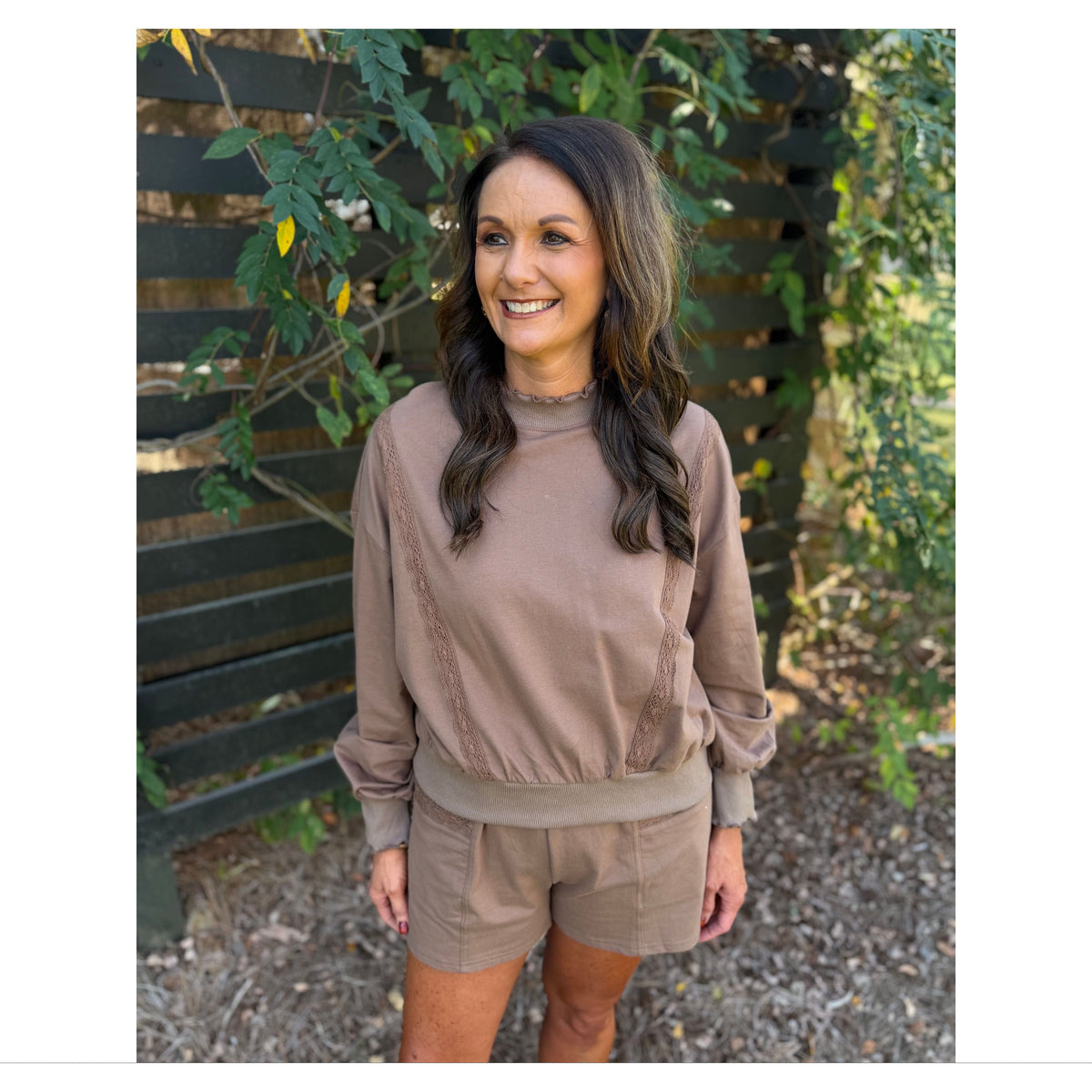 Annie Ks Boutique mocha lounge set with a cropped sweatshirt featuring lace trim and matching drawstring shorts.