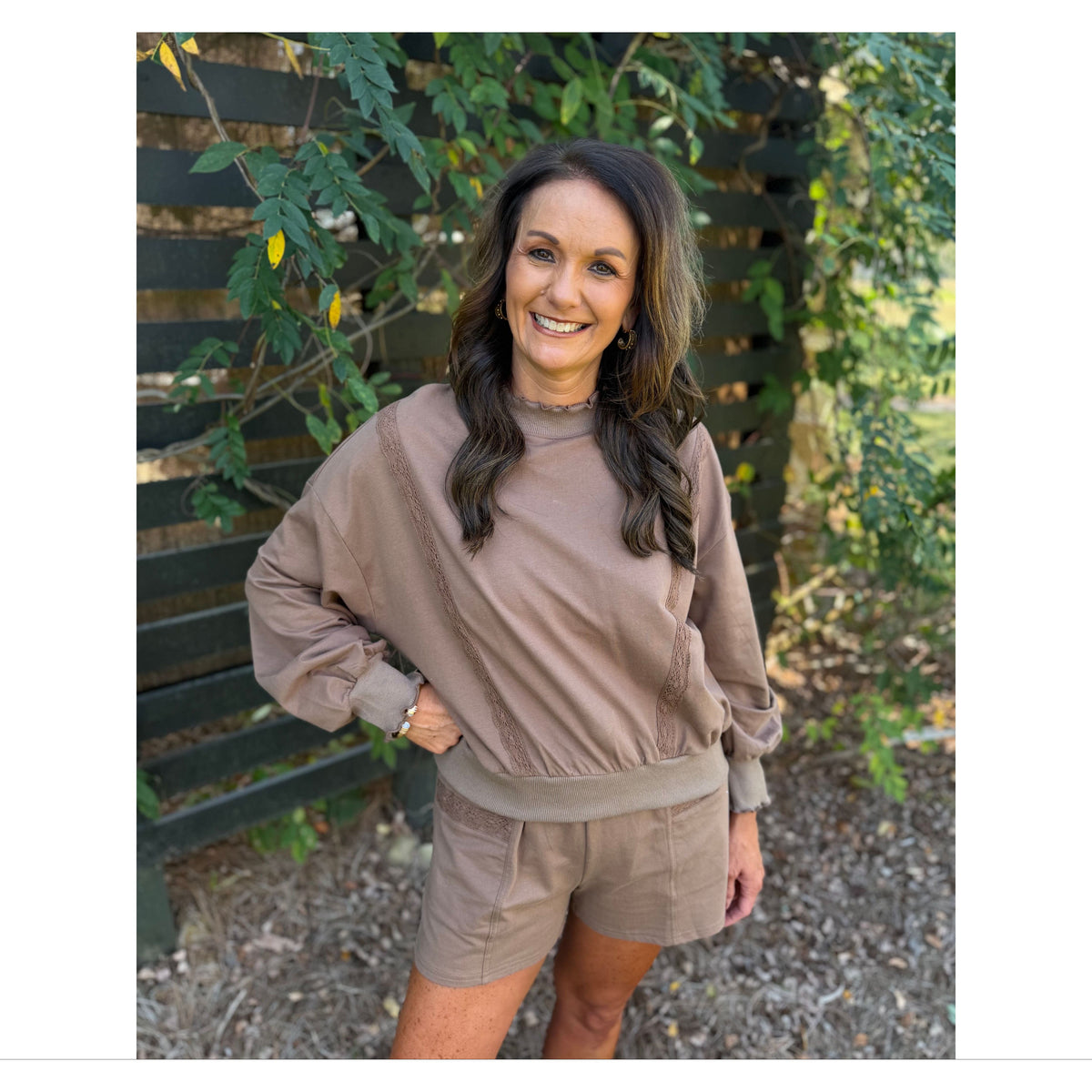 Annie Ks Boutique mocha lounge set with a cropped sweatshirt featuring lace trim and matching drawstring shorts.