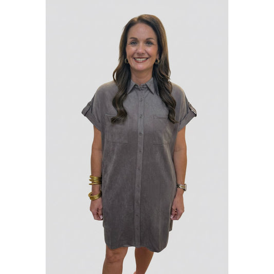 Annie Ks Boutique mocha faux suede shirt dress with button-front closure, chest pockets, and relaxed drop shoulders.