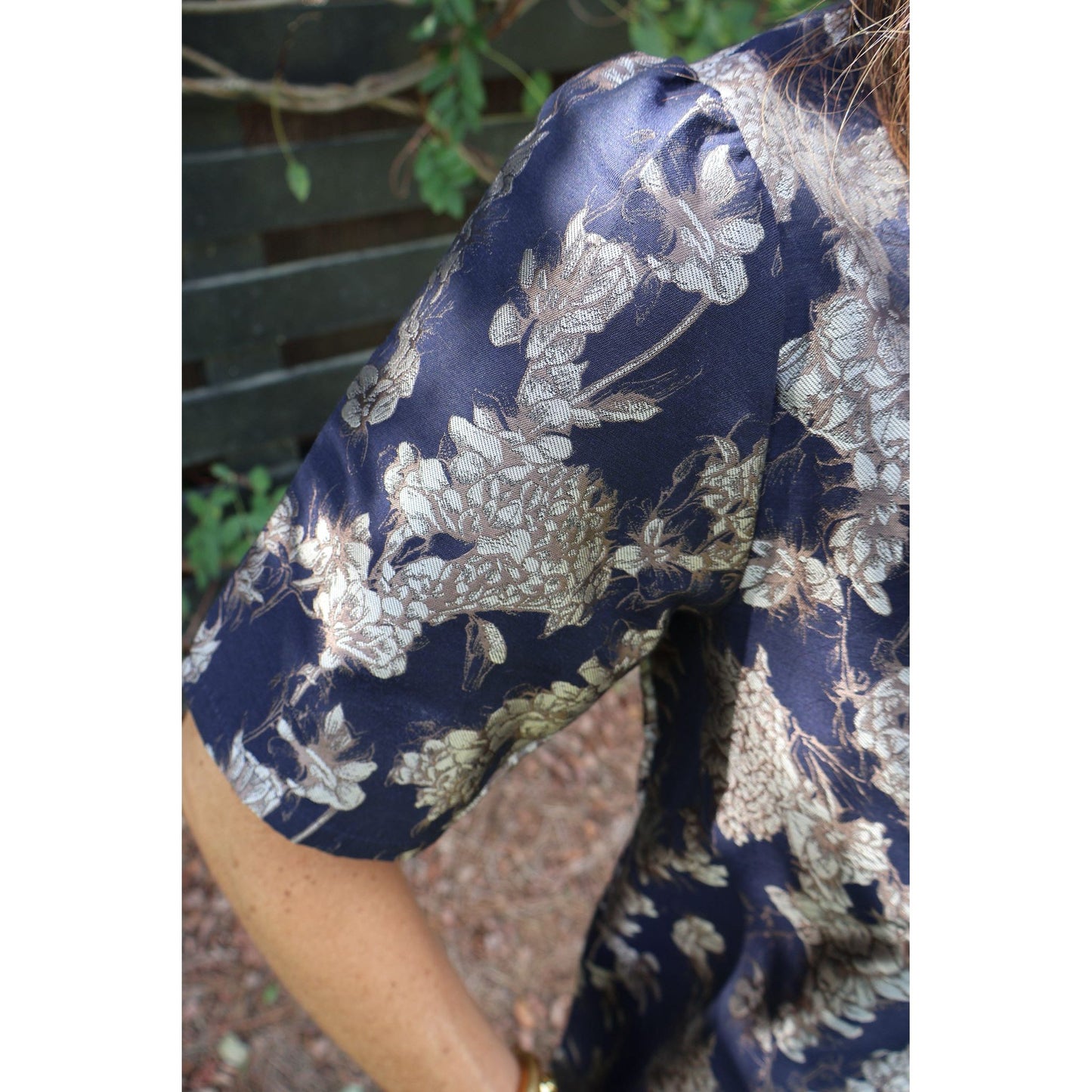 Annie Ks Boutique navy floral jacquard dress with textured fabric detail and short sleeves