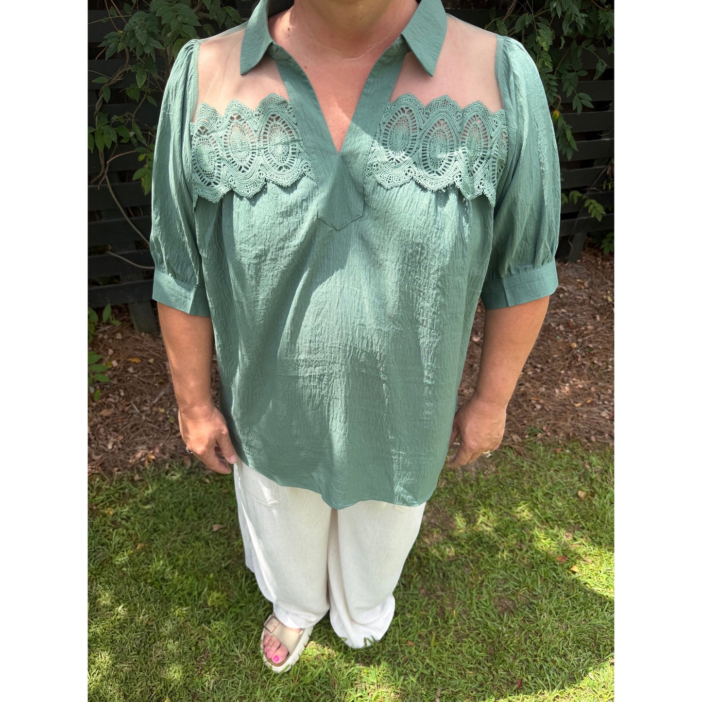 Annie Ks Boutique olive blouse with puff sleeves, sheer mesh shoulder panels, and intricate lace trim details.