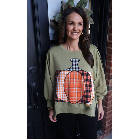 Annie Ks Boutique olive green French terry sweatshirt featuring a plaid patchwork pumpkin design and raw-edge details