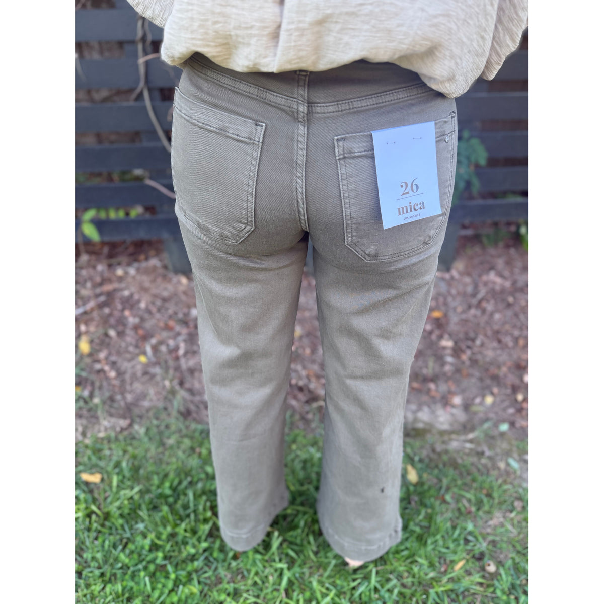 Annie Ks Boutique Nandor high-rise wide leg crop pants in olive green cotton-stretch fabric, back view.