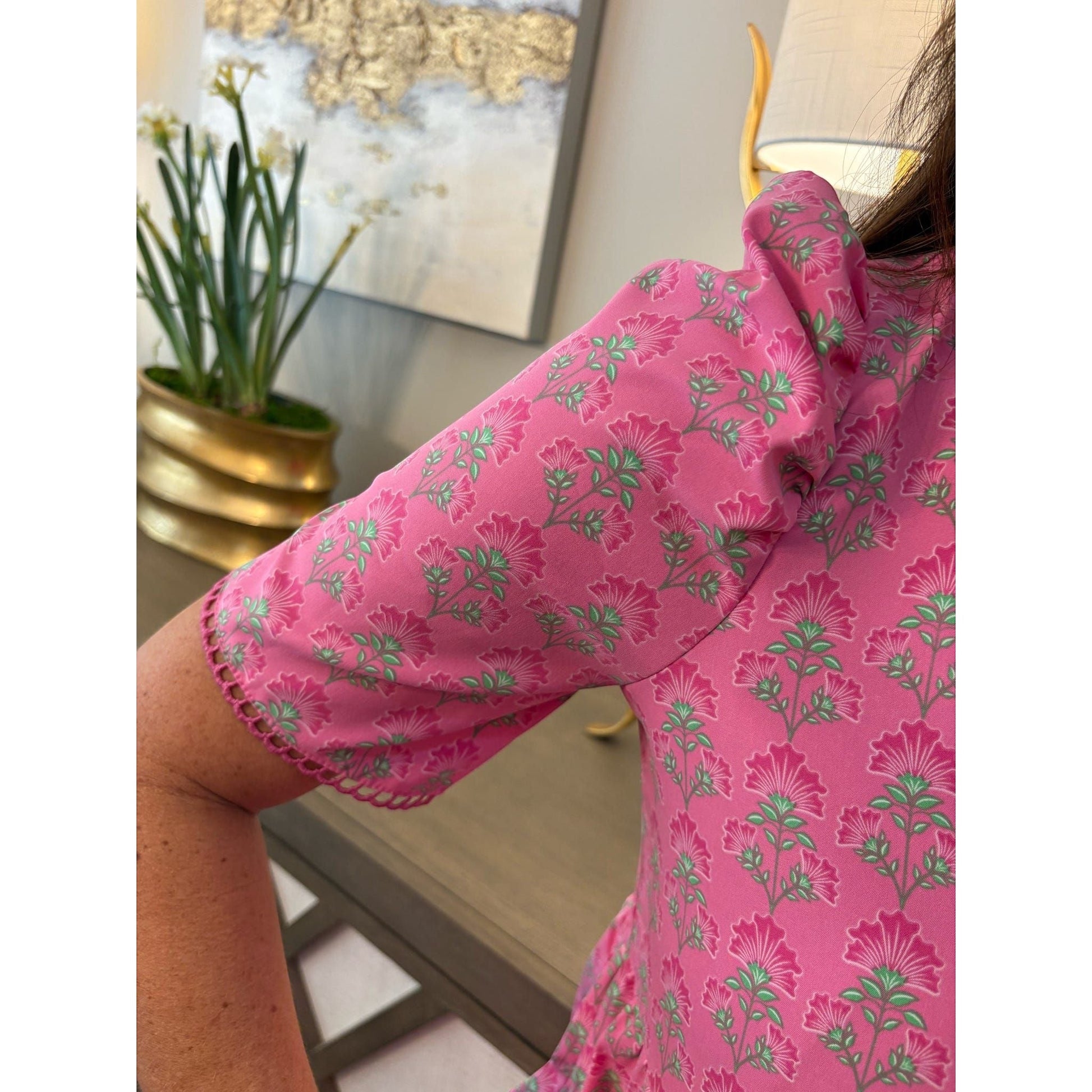 Annie Ks Boutique Adelyn mini dress in pink with floral print, puff sleeves, and delicate scallop trim detail.