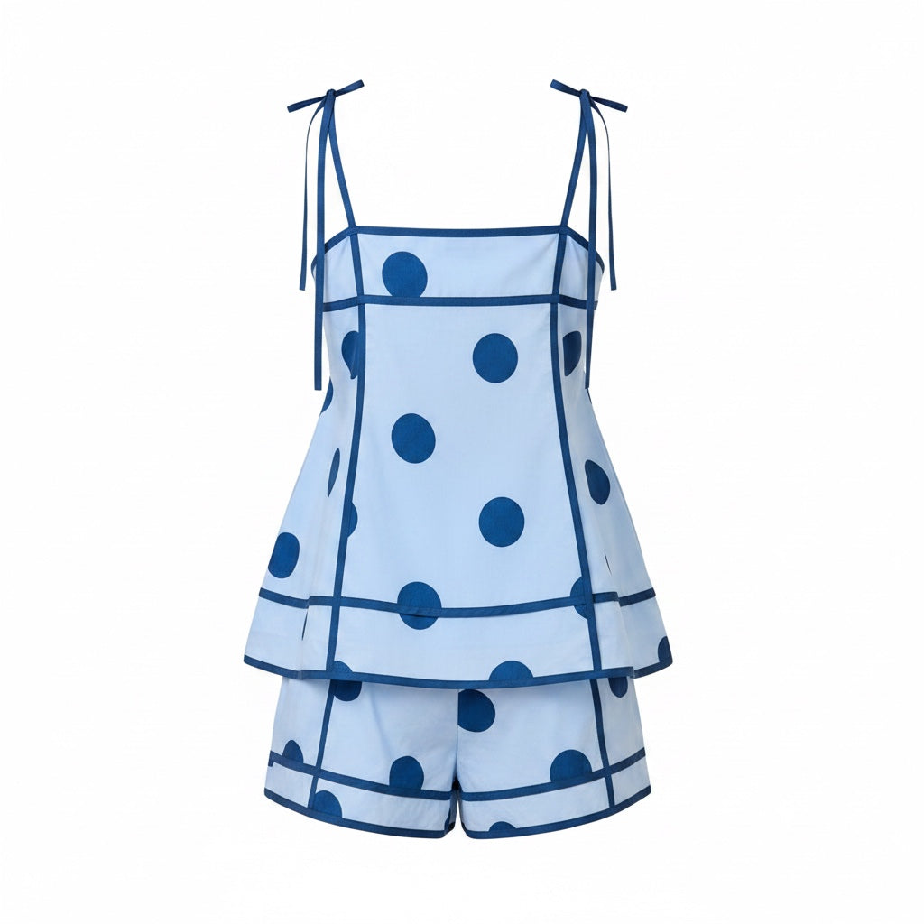 Annie Ks Boutique light blue polka dot swing cami and high-waisted shorts set with dark blue contrast binding.