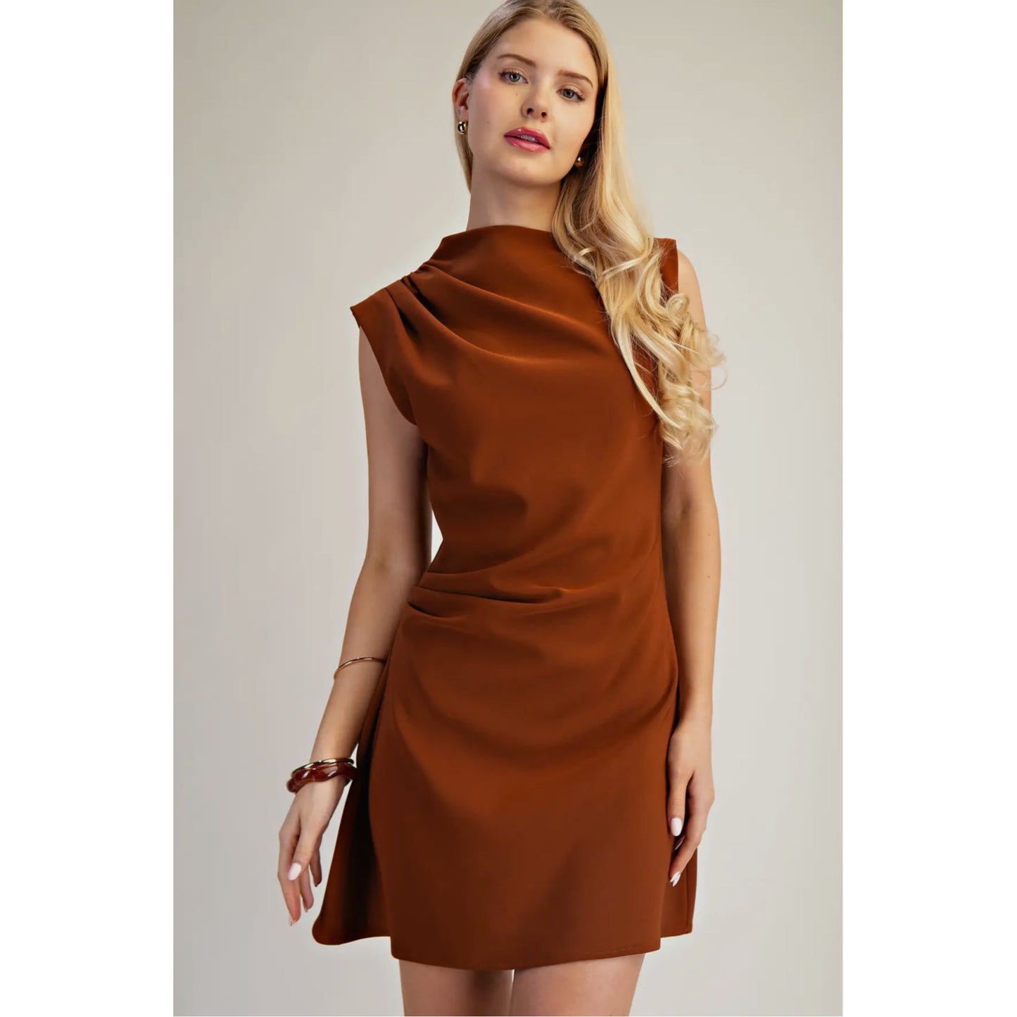 Annie Ks Boutique Riley mini dress in rust brown with a boat neckline and structured stretch fabric on a model