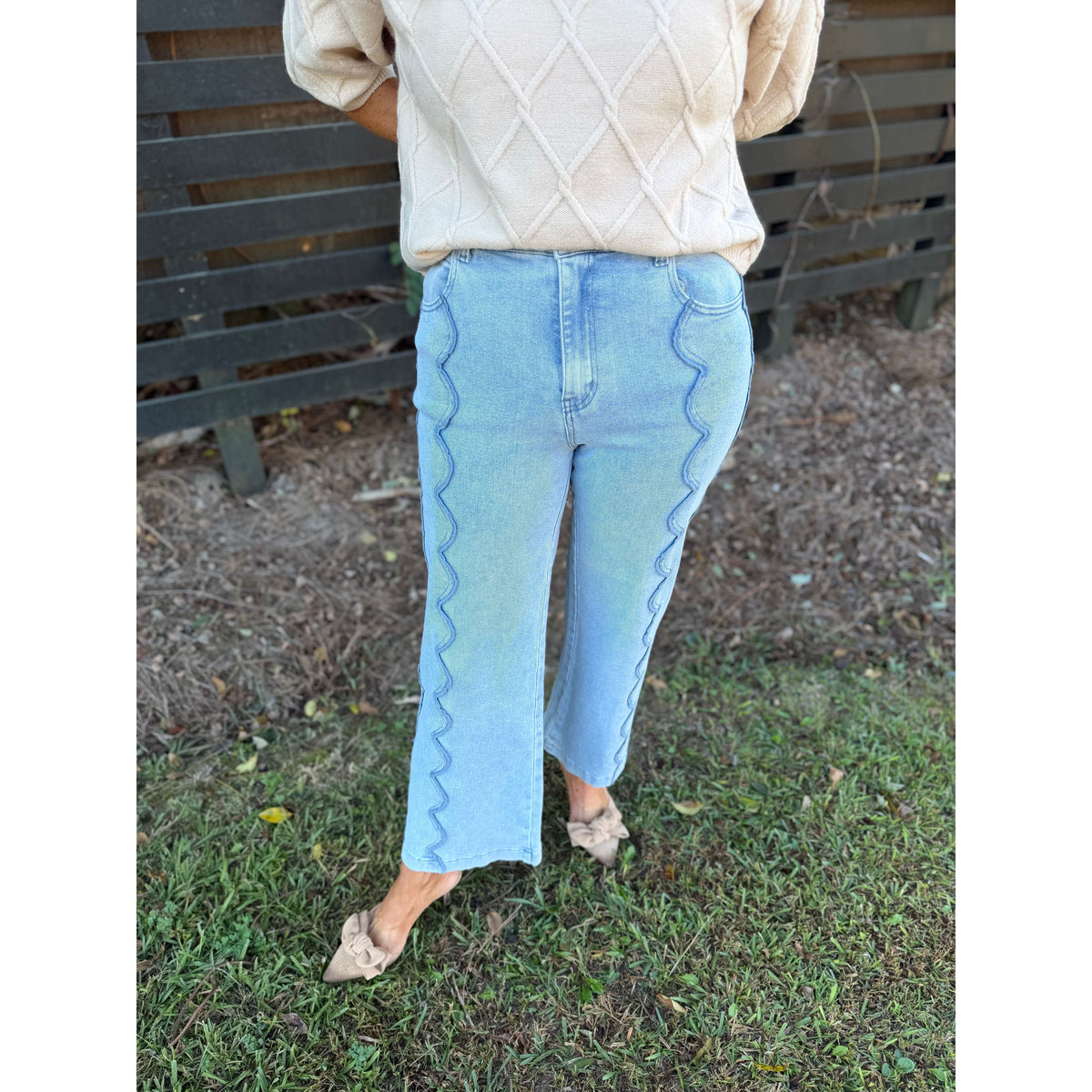 Annie Ks Boutique high-rise wide-leg denim jeans in light blue wash with unique scalloped front seam detailing
