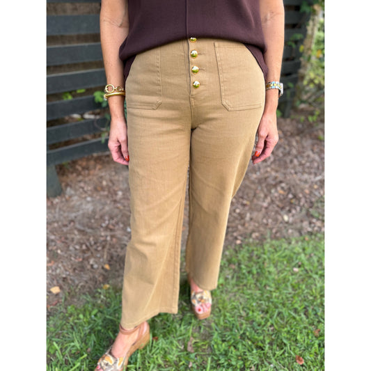 Annie Ks Boutique tan wide-leg trousers featuring a front button closure and functional pockets in cotton-blend fabric
