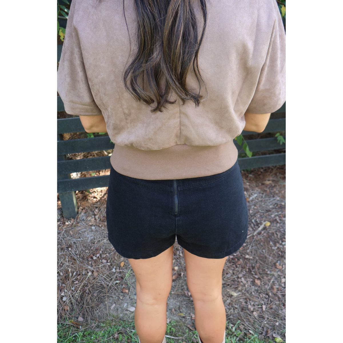Annie Ks Boutique washed black woven skort with a back zipper closure worn with a tan short-sleeve top