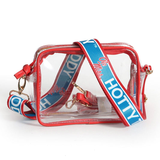 A clear PVC cosmetic pouch with red trim and a blue and white 'Hotties' branded shoulder strap, shown on a white background.